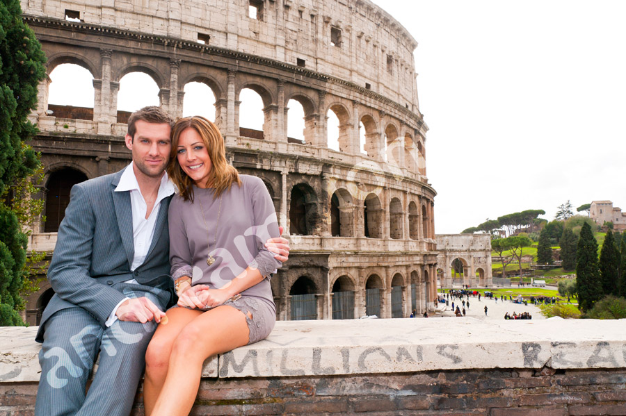 Together in front of the Colosseum.