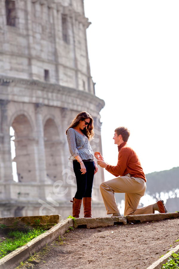 Wedding Vows proposals in Rome. Picture taken in front of the Roman Colosseum in Rome Italy.