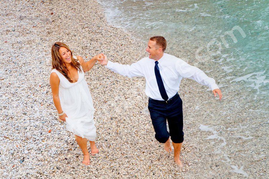 Walking on the pebble beach on the island of Capri Italy 