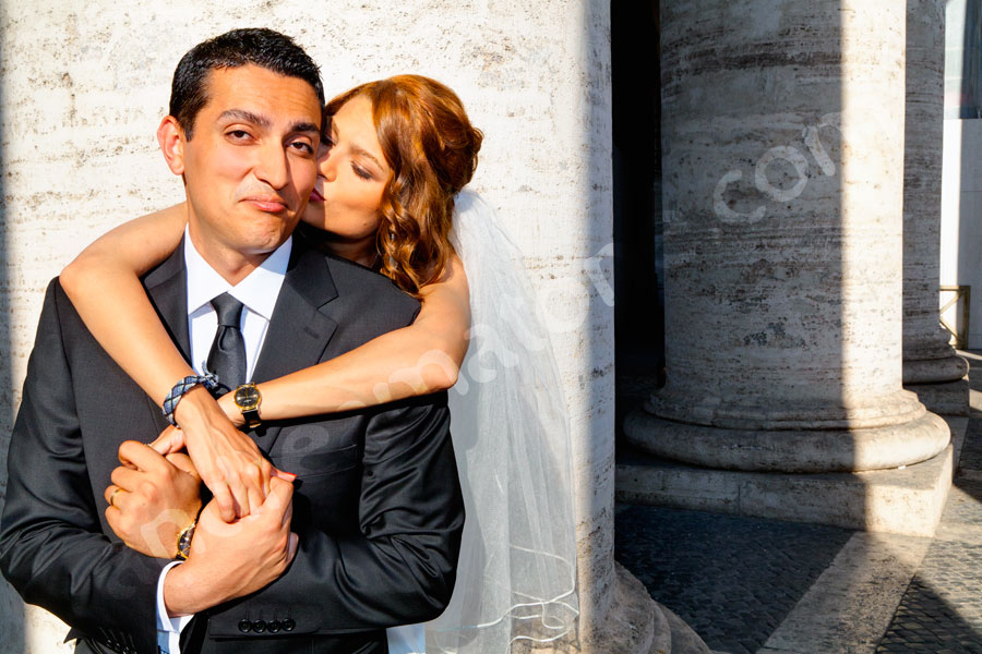 Couple in love holding each other in San Peter square