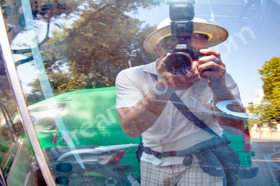 The wedding photographer taking a picture of himself