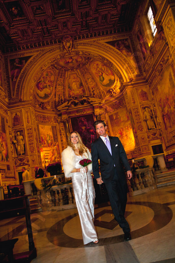 Bride and groom walking out of the church after the ceremony