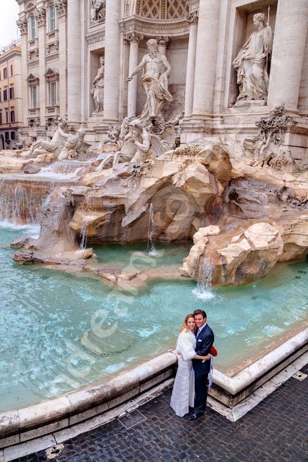 Bride and groom photographed from above piazza at Fontana di Trevi 