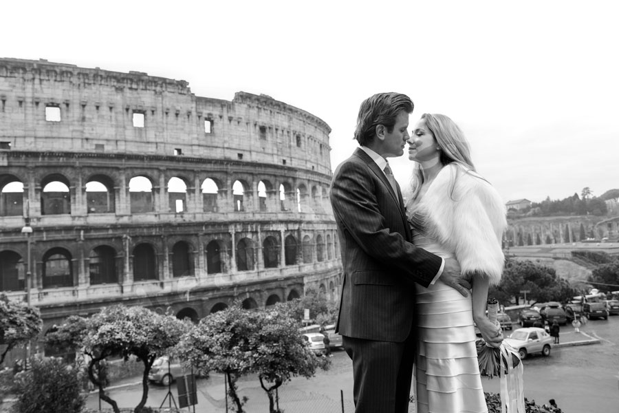 Bride and groom kissing at the Roman Colosseum Rome Italy 