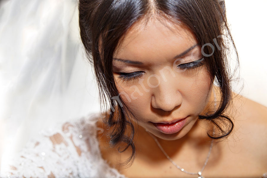 Bride visage photographed during the final preparation 