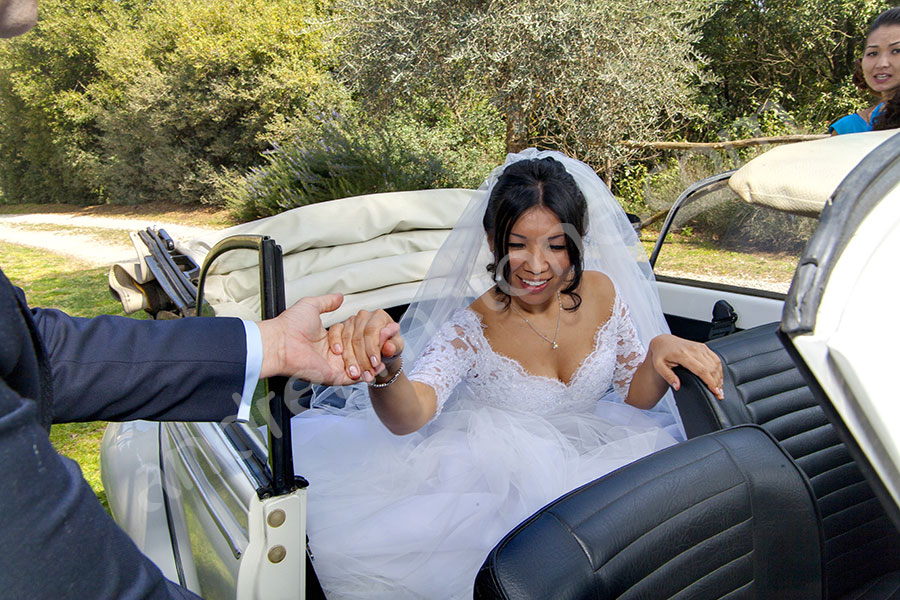 Helping the bride exiting the car 