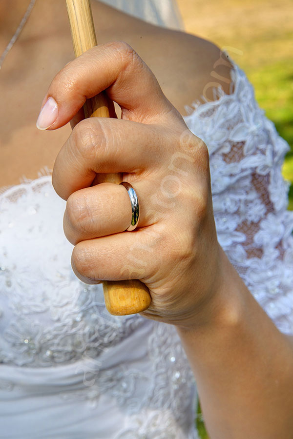 Bride wearing the ring on her finger 