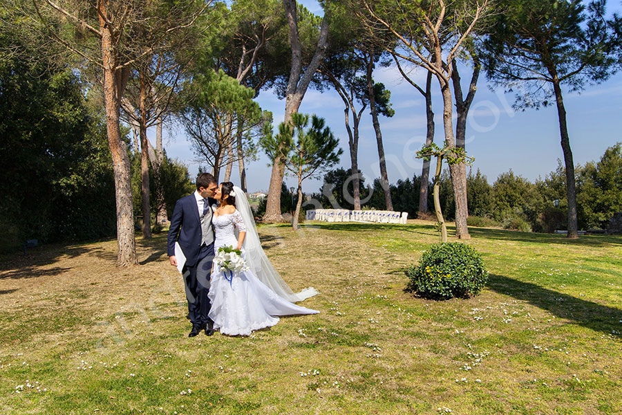 Newlyweds together kissing after the ceremony in Italy 