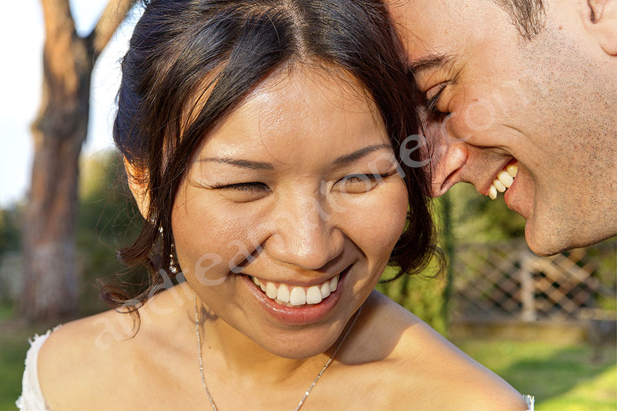 Close up bride and groom face portrait smiling 