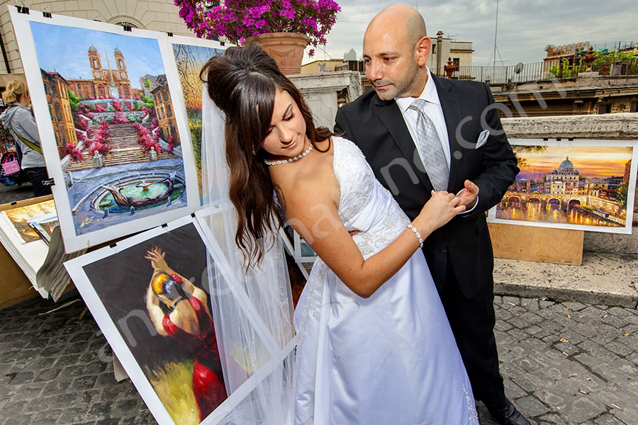 Bride and groom together at Trinita' dei Monti top steps Piazza di Spagna