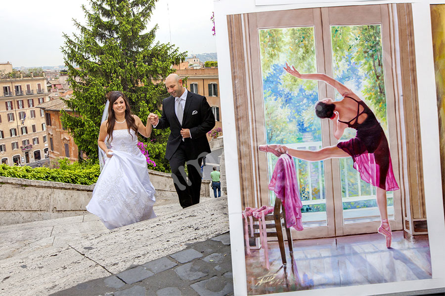 Just married couple walking up the Spanish steps next to a dancer painting.