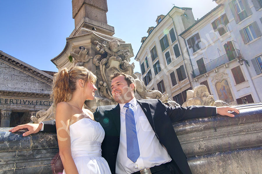 Bride and groom posing at the Pantheon in downtown