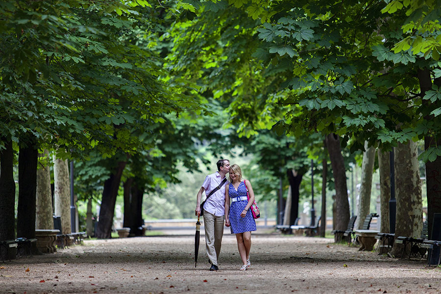 Walking in Parco Villa Borghese during an engagement session