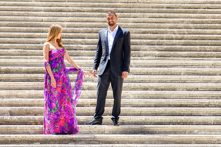 Taking pictures standing at the steps of Piazza del Campidoglio