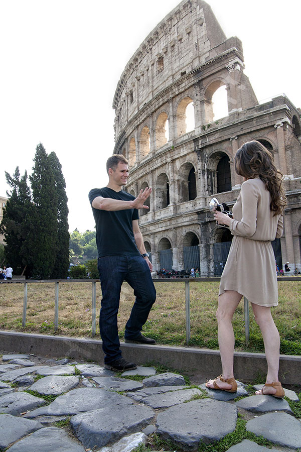 Taking a picture underneath the Colosseum