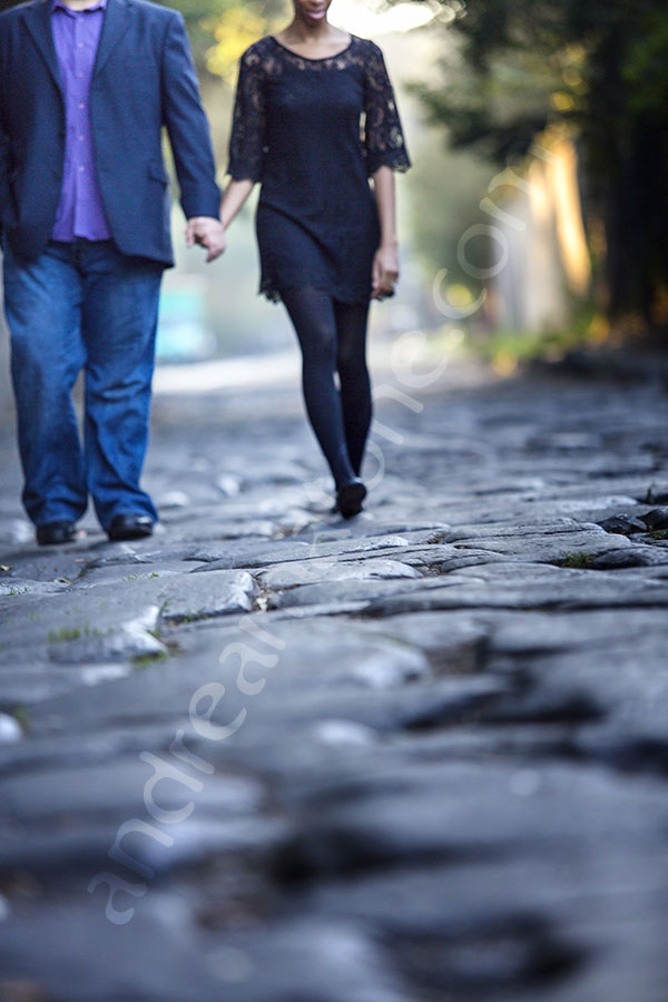 Walking together hand in hand on the ancient Appian road.