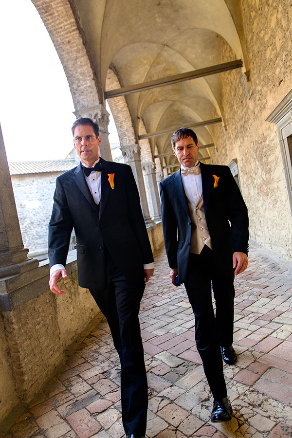 Groom and best men walking to the wedding ceremony in Castello Odescalchi Italy