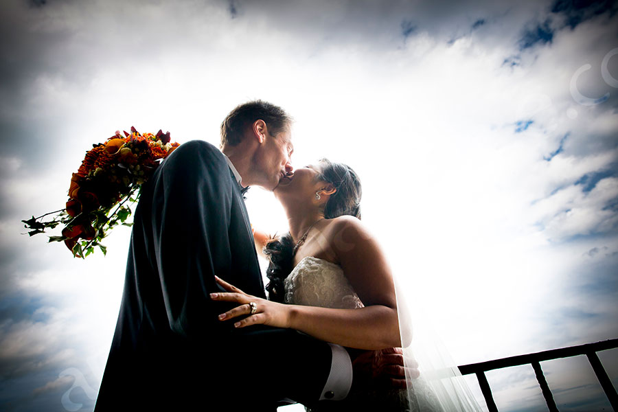 Wedding couple kissing after the wedding ceremony