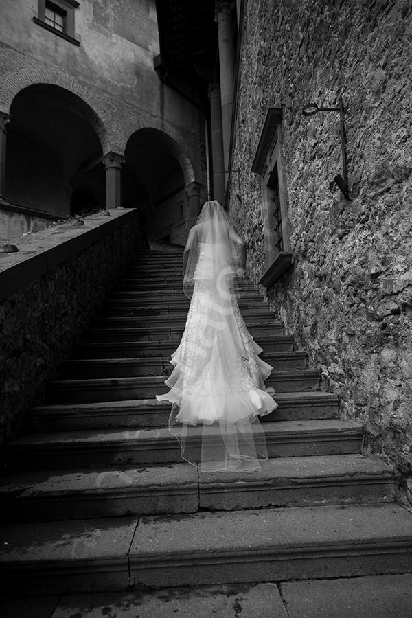 Black and white photo of the bride taken in the castle