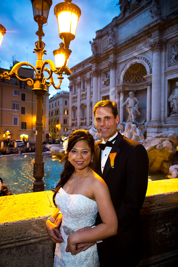 Newlyweds evening photography at the Trevi fountain in Rome Italy