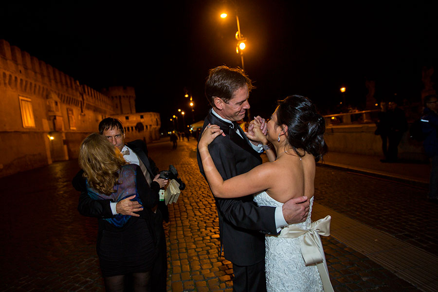 Dancing in the street of Castel Sant'Angelo in Rome Italy