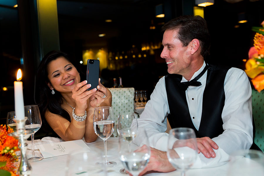 The bride photographer taking a picture during the wedding dinner in Les Etoiles Rome