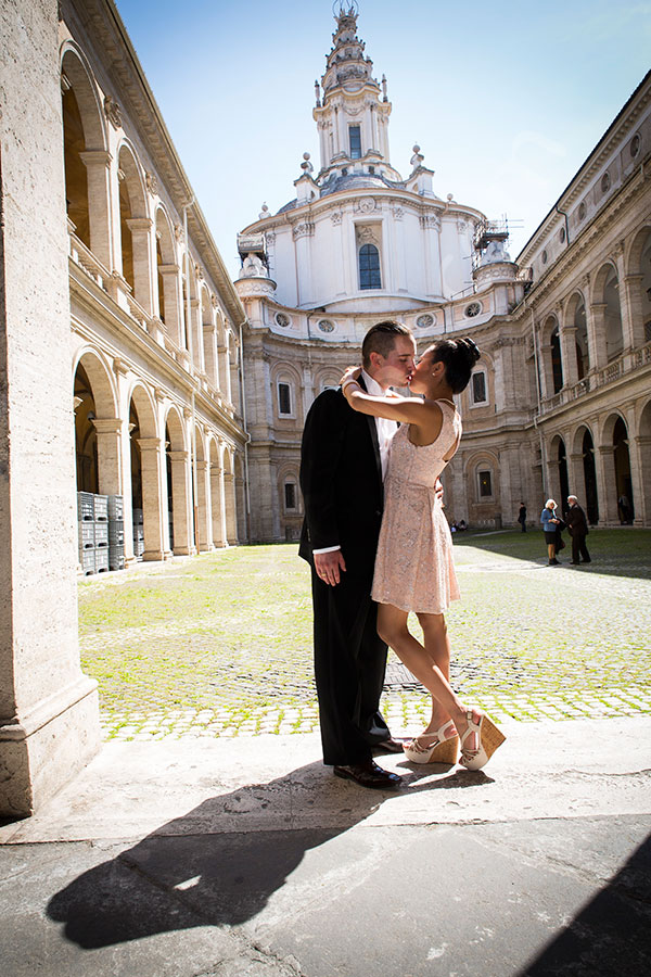 Couple kissing during an engagement session with a photographer in Rome Italy
