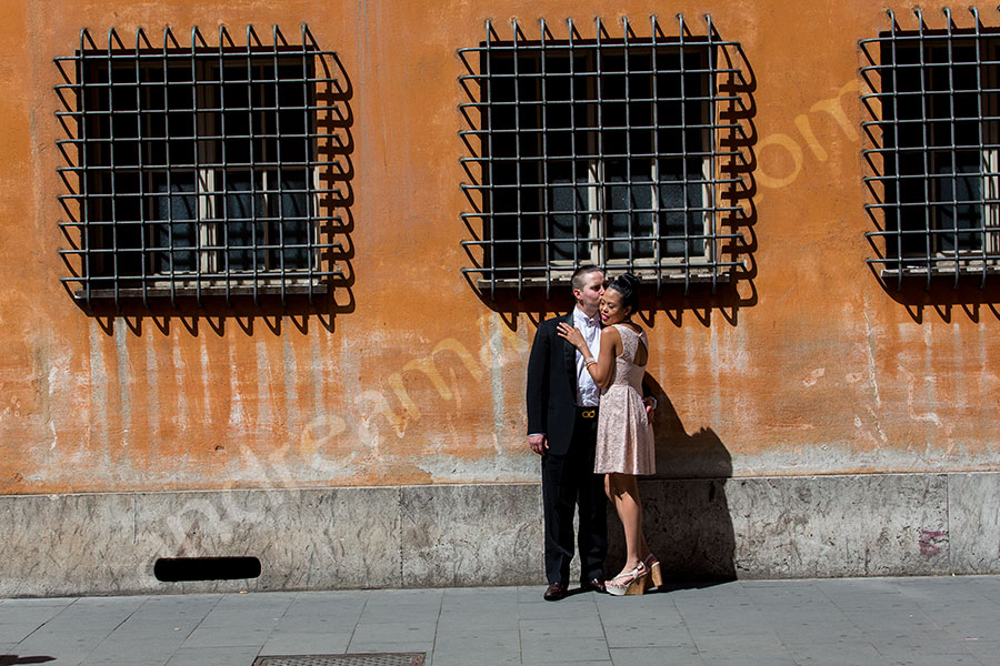 Couple intimate in the streets of Rome