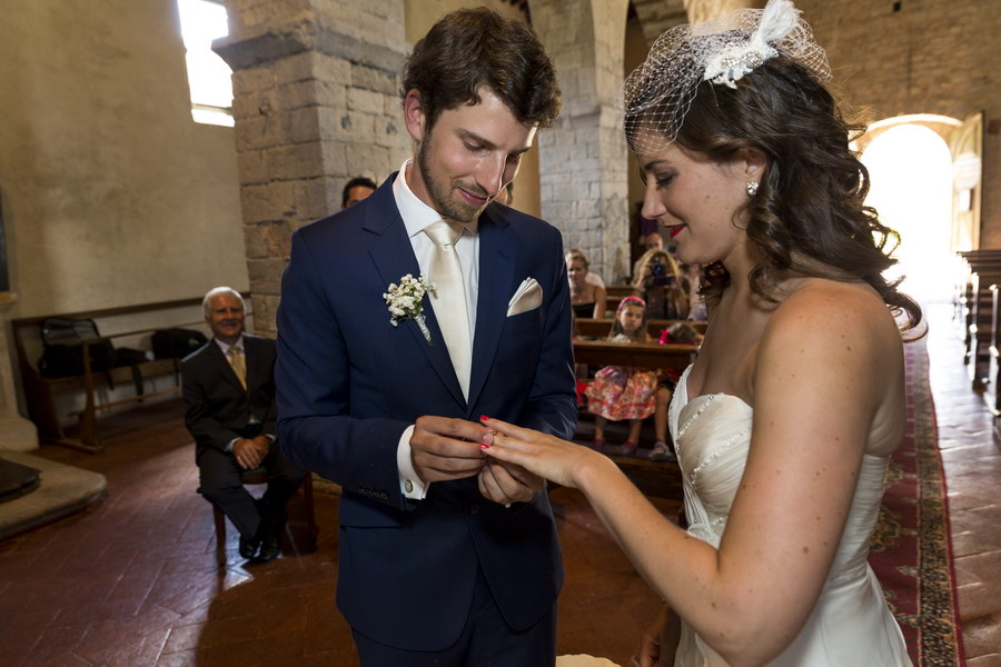 Bride and groom exchange rings