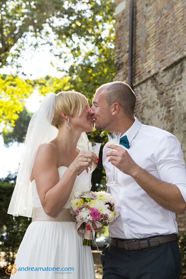 Bride and groom kiss