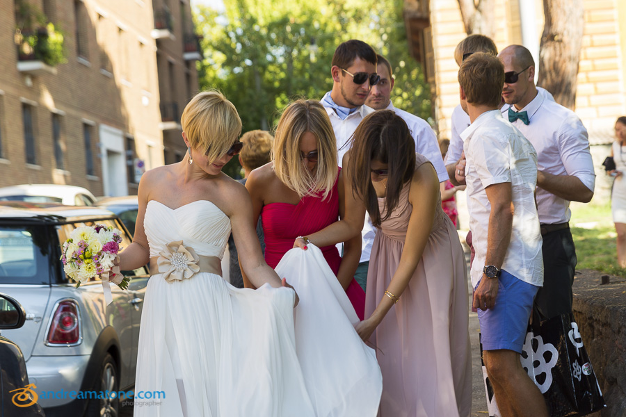 Brides and guests helping out the bride