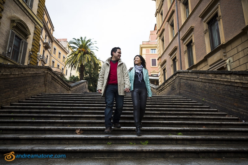 Couple on a honeymoon walking down the stairs