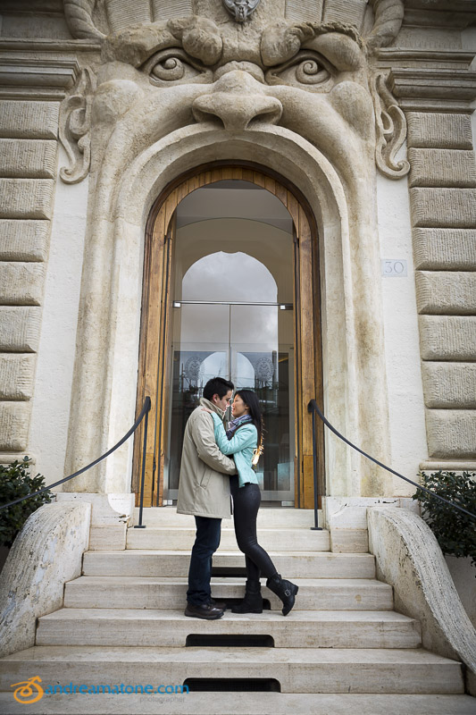 Romantic couple in Via Gregoriana in Rome Italy.