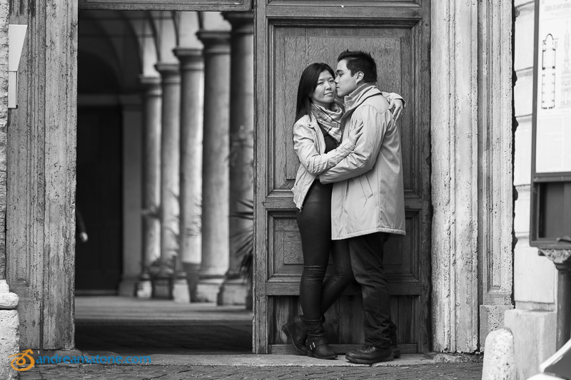 Black and white picture outside a cloister in the historical city center.