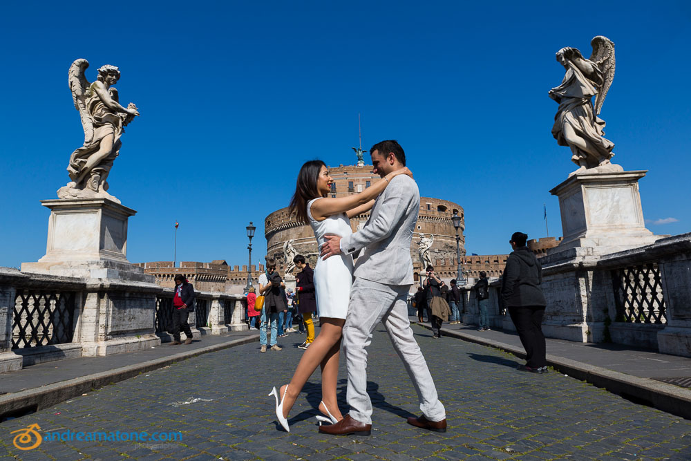 Pre Wedding Photographer. Session taking place on bridge Castel Sant'Angelo.