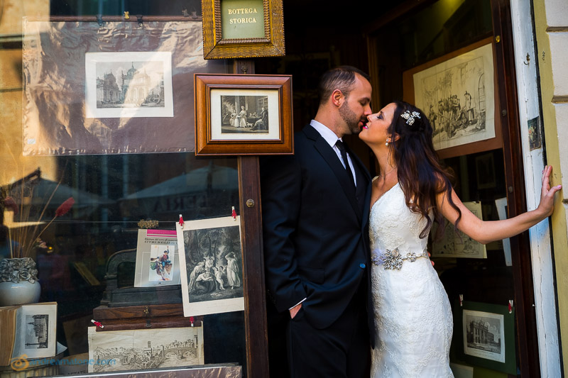 Couple close together at an antique store.