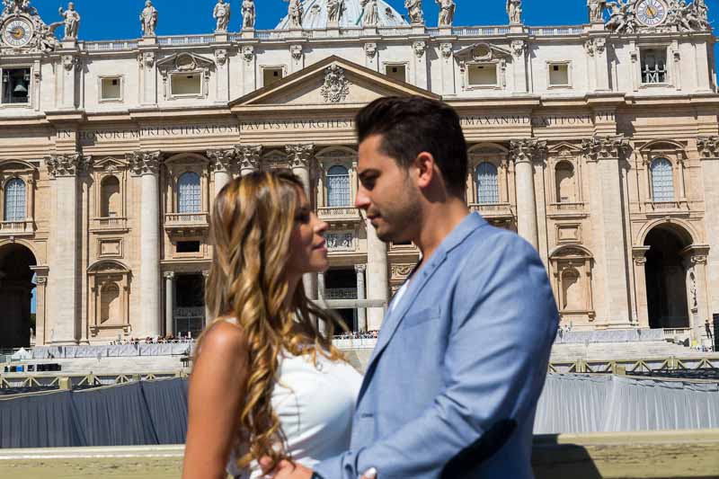 Picture taken of a couple in front of Saint Peter's Basilica in the Vatican Rome Italy