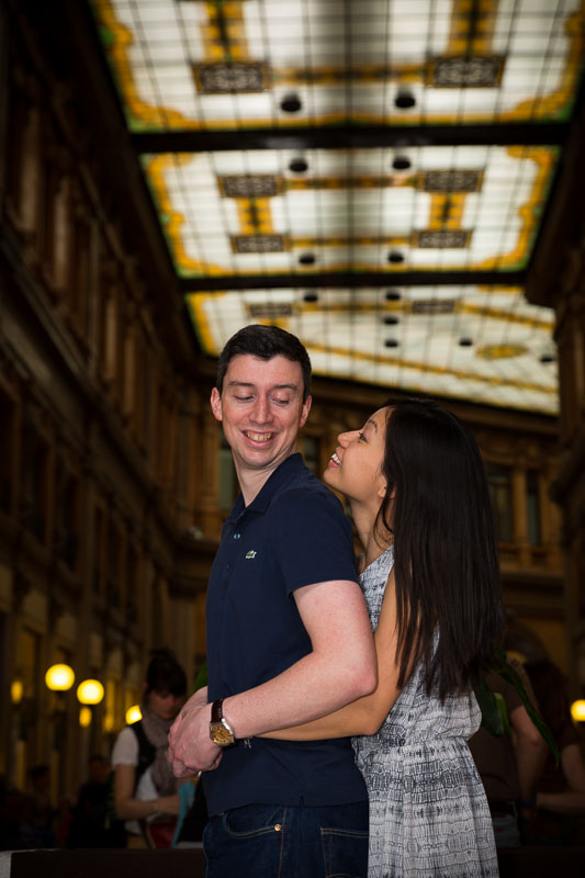 Interior shot of a couple in Galleria Alberto Sordi in Rome