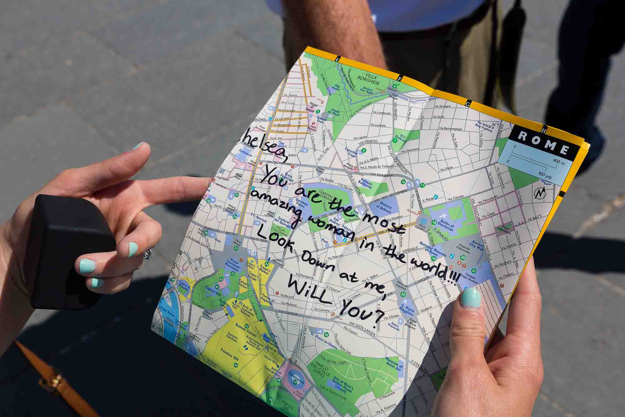 The wedding proposal message written on a map