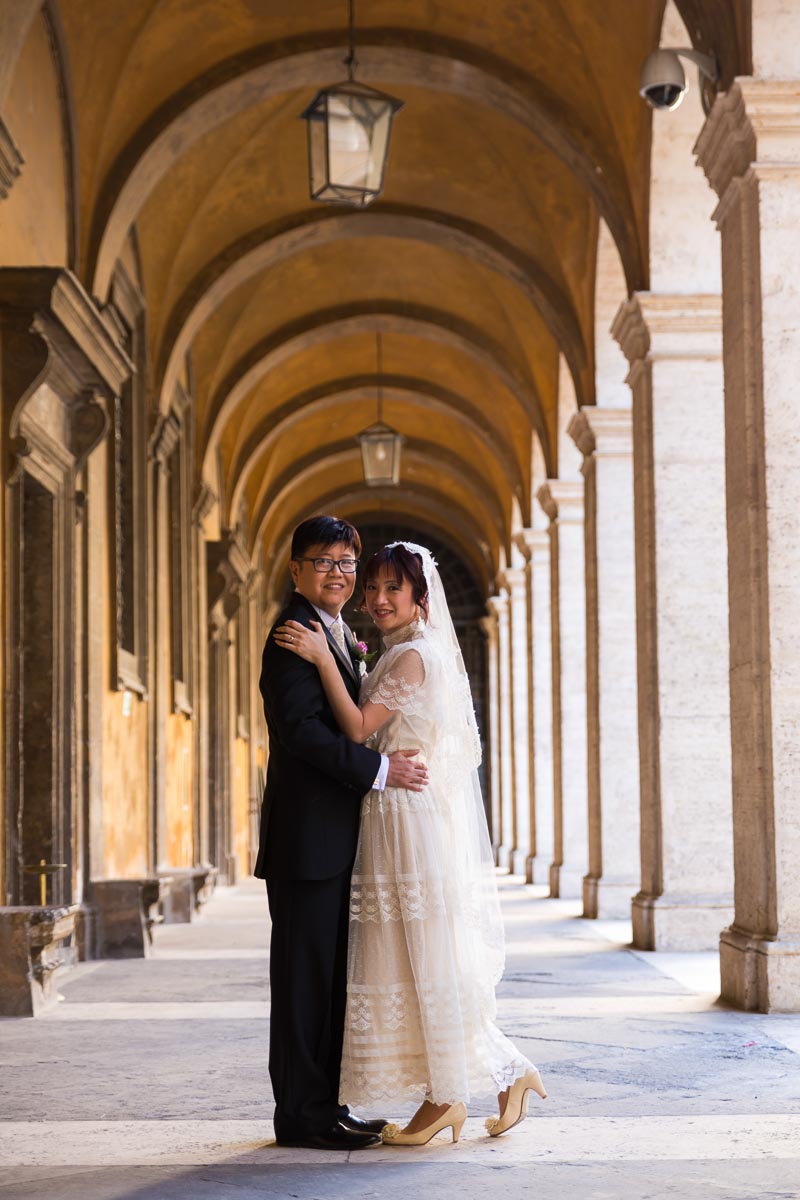 Post wedding ceremony picture under columns