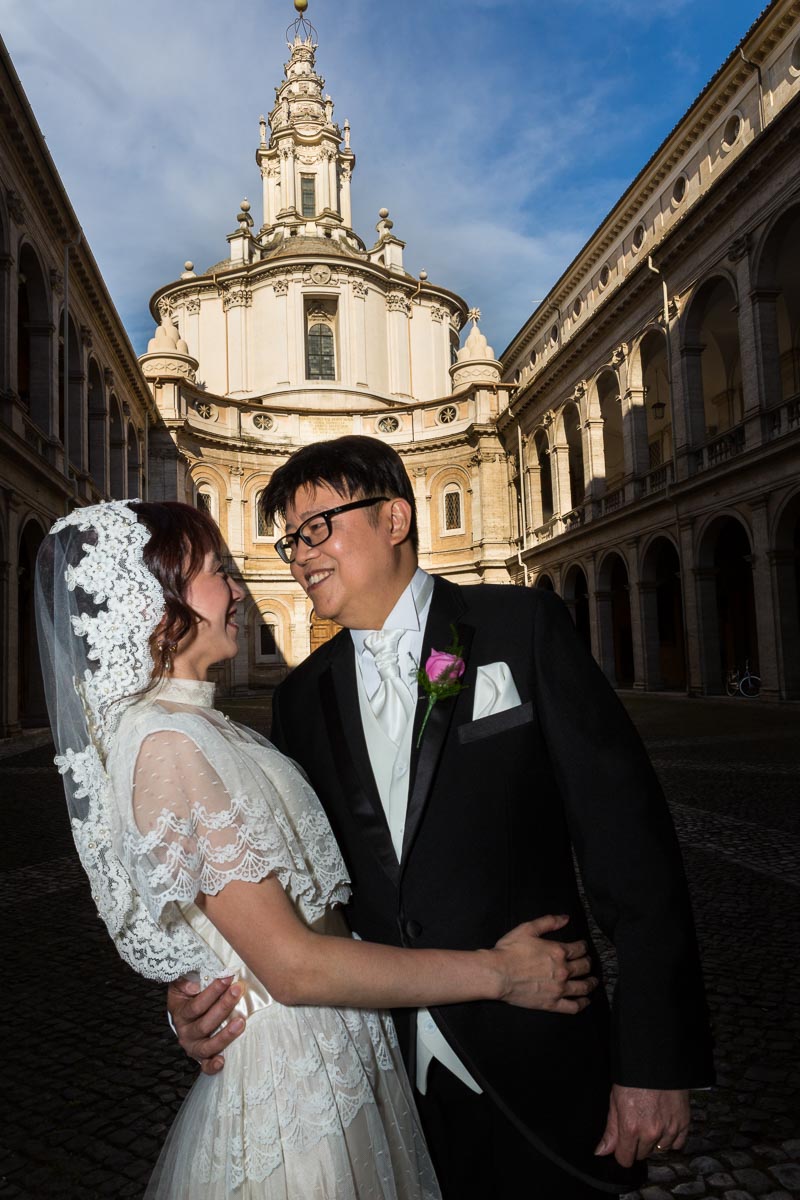 Image of newlyweds just married in Rome at San Ivo alla Sapienza