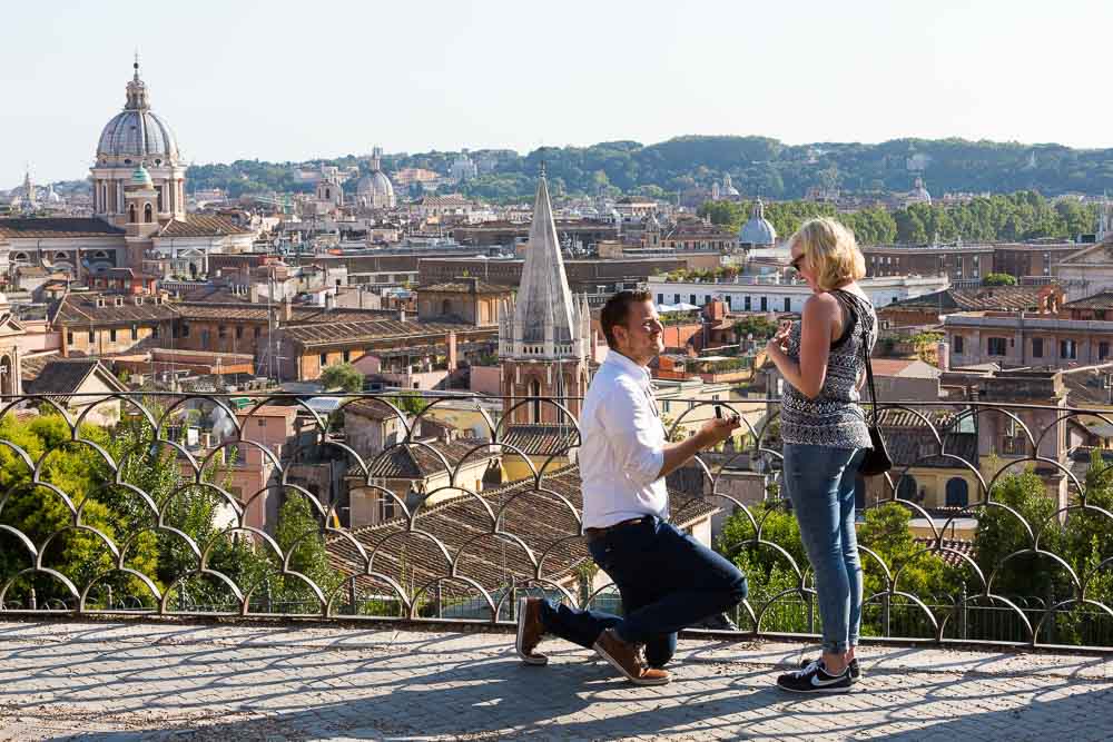 Surprise proposal taking place at Parco del Pincio overlooking the roman rooftops.