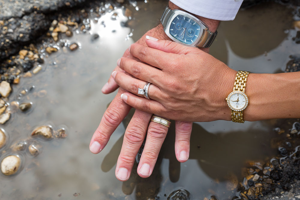 Wedding ring picture taken in front of a puddle