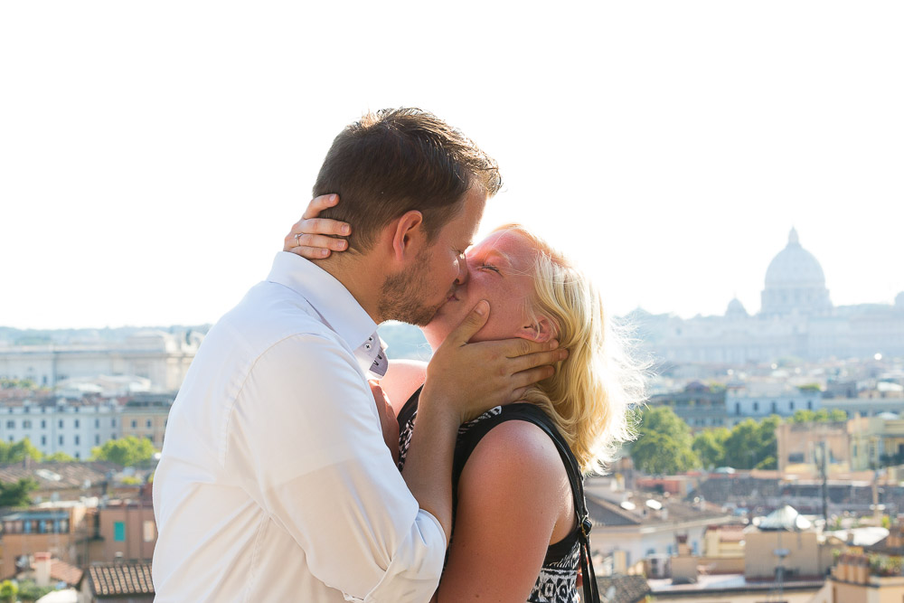 Couple just engaged kissing in Italy.