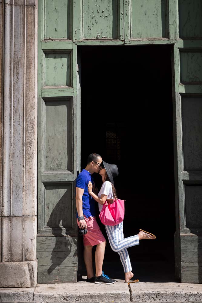 Kissing couple during a photo session.