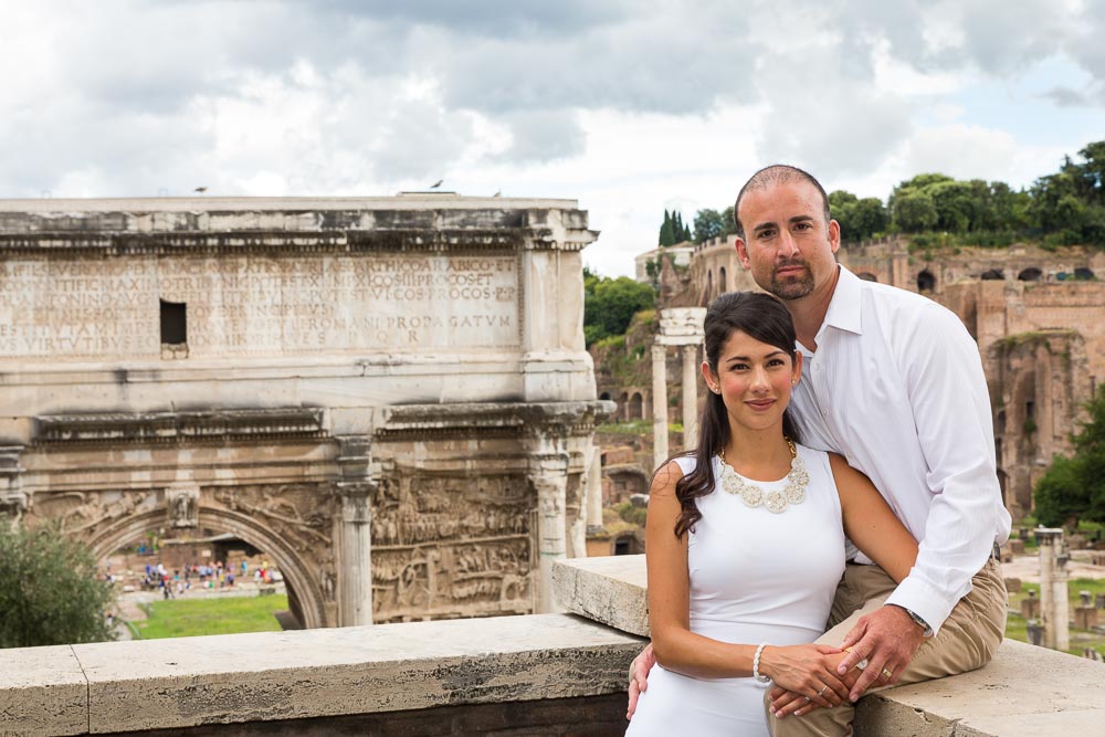 Portrait at the Forum with ancient monument in the back.