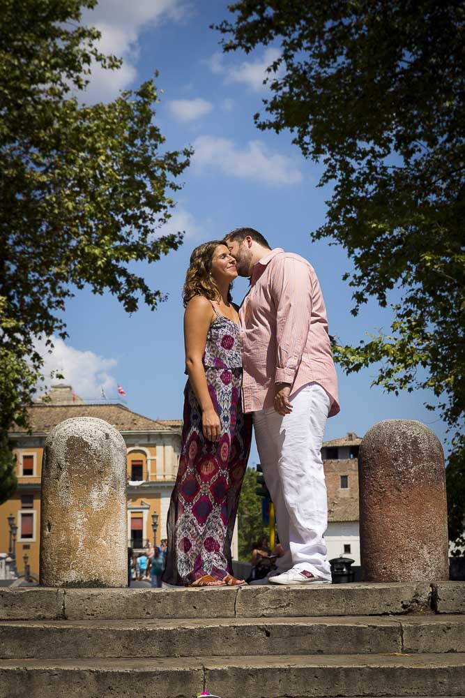 Romantically kissing in the streets after a proposal.