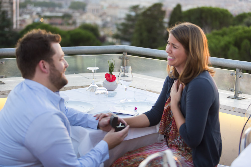 Surprise engagement proposal on a terrace view over Rome