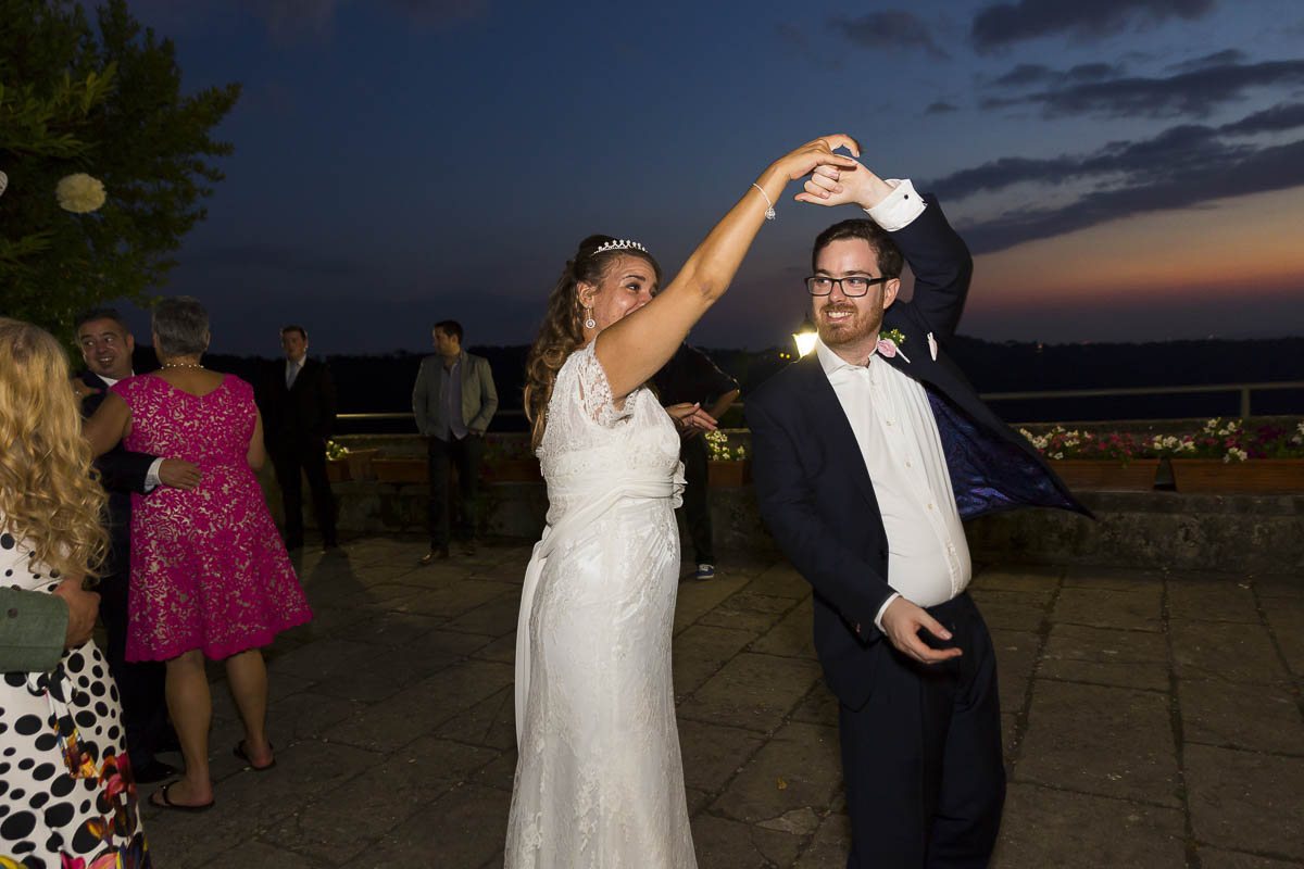 Groom and Bride dancing together.