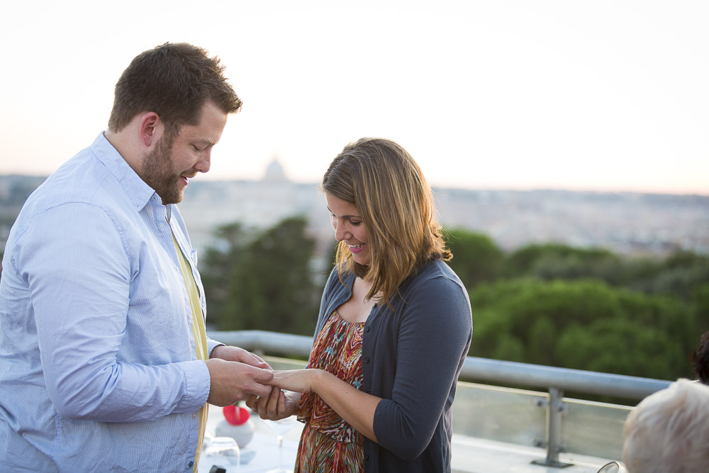 Putting the engagement ring on the finger. 